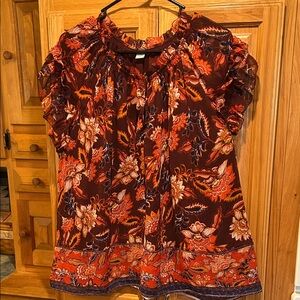 Old NavyPretty floral design top with maroon underlay with ruffled arm edging.